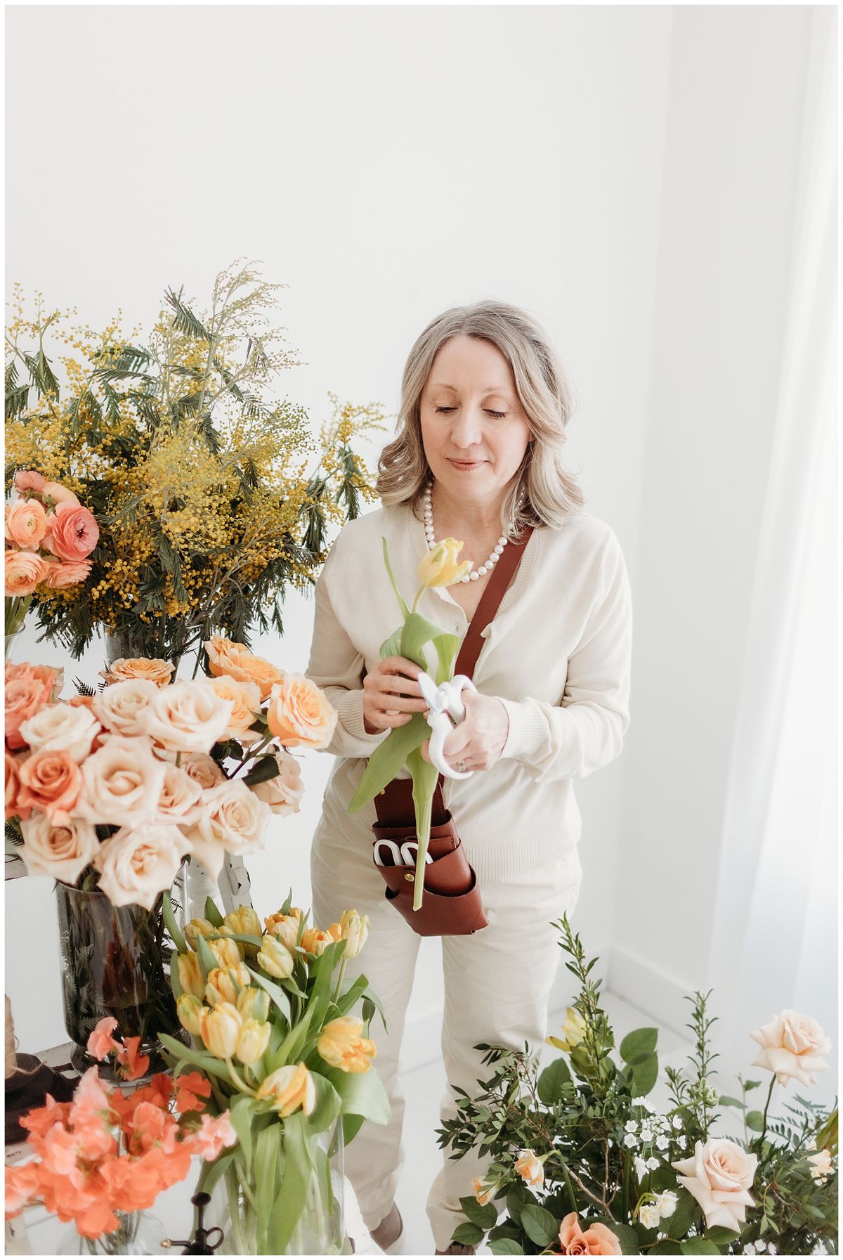 Florist among spring flowers